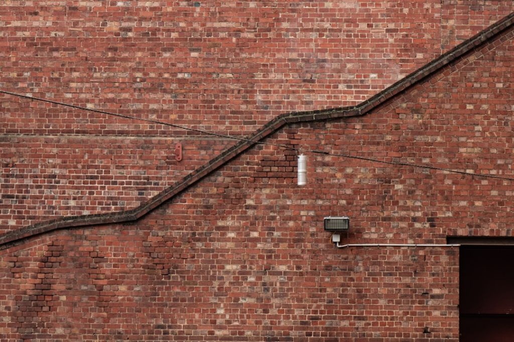 Photo industrial pipe style wall sconce