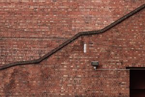 Photo industrial pipe style wall sconce